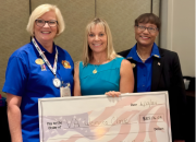 Michelle Zielenski, LCSW, Lead Women Veterans Program Manager, VISN 8, accepts a donation of more than $105K from Teresa Bachand, President, VFW Auxiliary, Department of Florida, and Cortina Barnes, National Representative and Past National President, VFW Auxiliary, on June 15 in Orlando, Fla. The d